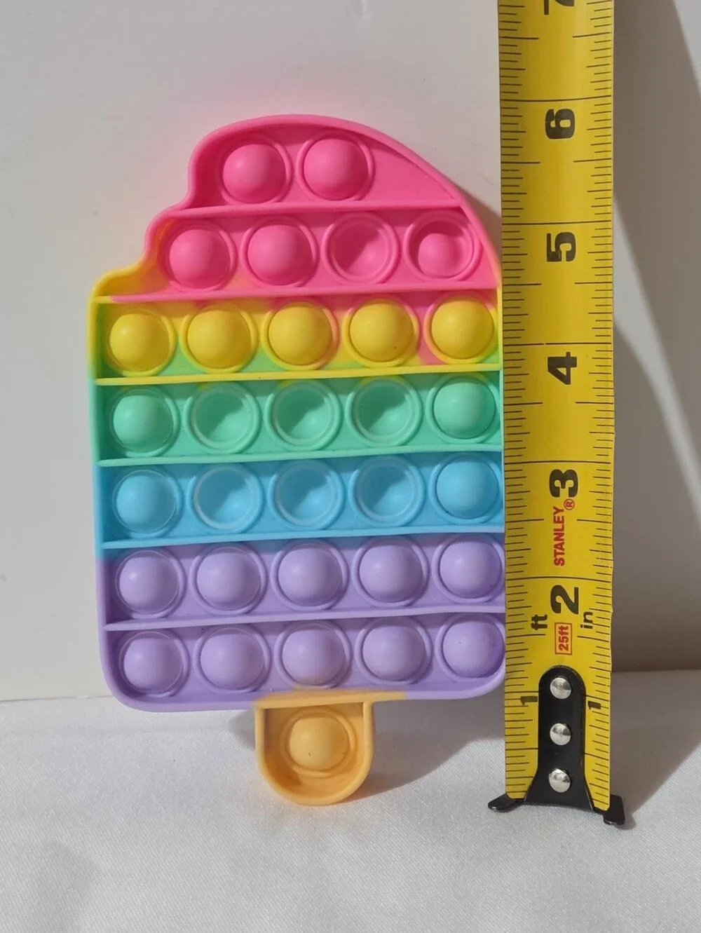 popcicle shaped rainbow pop-it fidget toy
